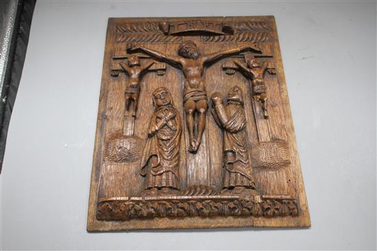A set of four 19th century Continental relief carved oak religious plaques, depicting biblical scenes, 38 x 29cm